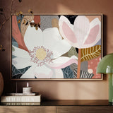 A framed canvas print depicting an abstract floral design, displayed in a home setting.
