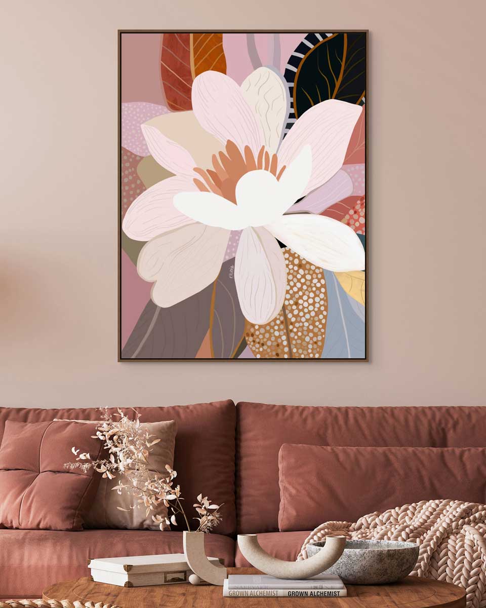 Decorative floral painting on a wall above a sofa with a coffee table.