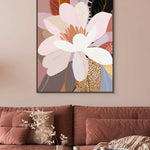 Decorative floral painting on a wall above a sofa with a coffee table.