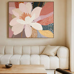 Living room with a large floral painting above a beige sofa.