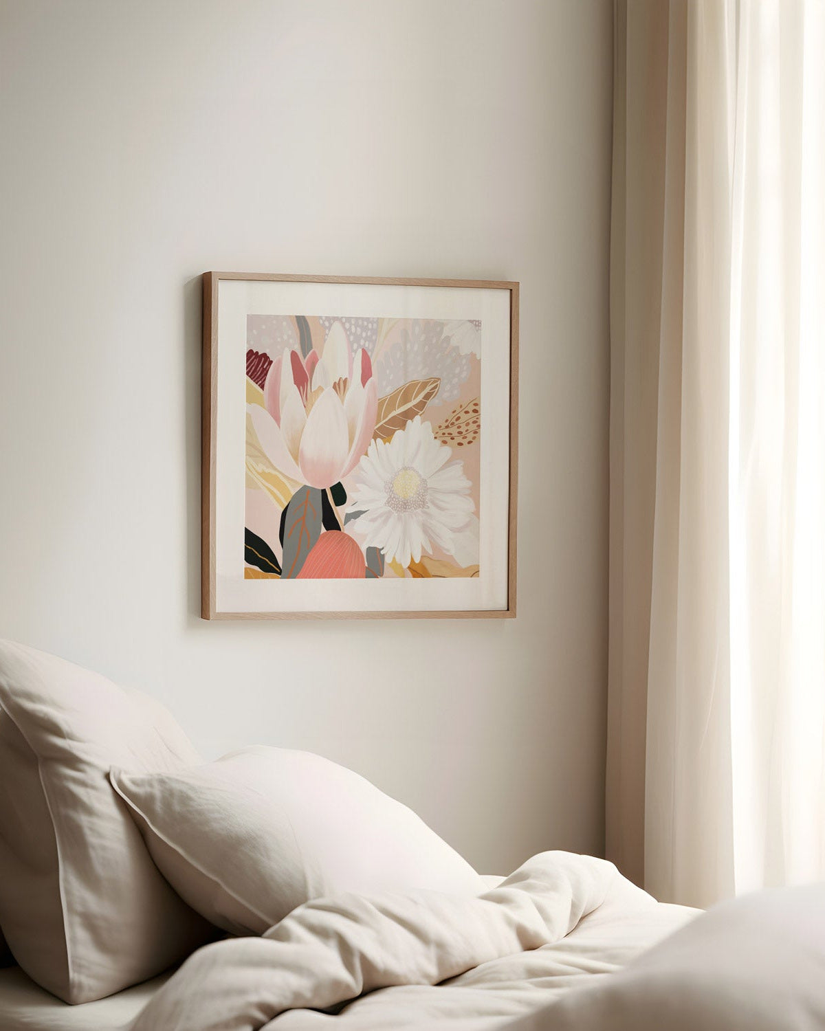 A framed floral print hanging on a wall over a bed in a cozy, well-lit room.