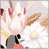A framed canvas print featuring abstract floral art, displayed above a white sofa with gold cushions, in a room with striped wallpaper.