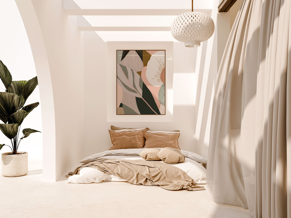 A framed canvas print titled 'Odeletta', featuring abstract geometric patterns in pink and navy colors, displayed above a wooden bench in a minimalist interior setting.
