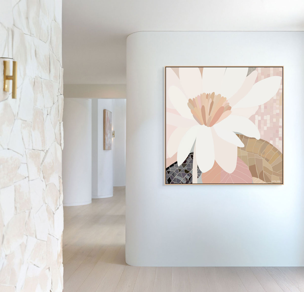 Framed abstract floral artwork on a white wall in a modern interior setting.