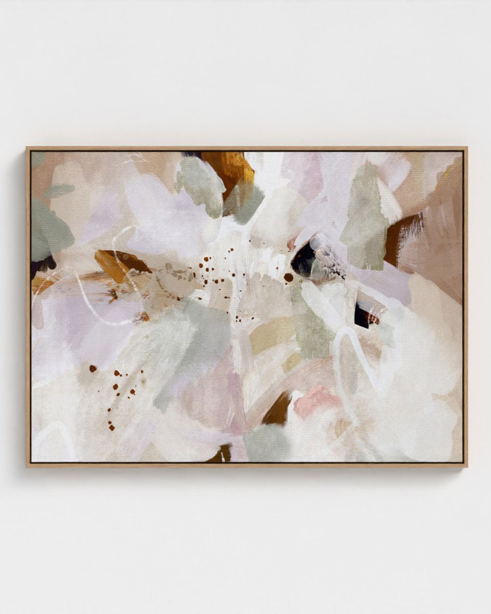 Abstract floral painting in a oak frame on a white wall