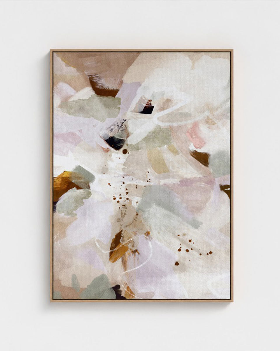 Abstract art print with soft colors on a white wall