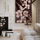 Modern living room with a large abstract floral painting on the wall.
