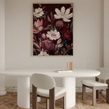 Dining room with a floral painting on the wall, white table, and chairs.