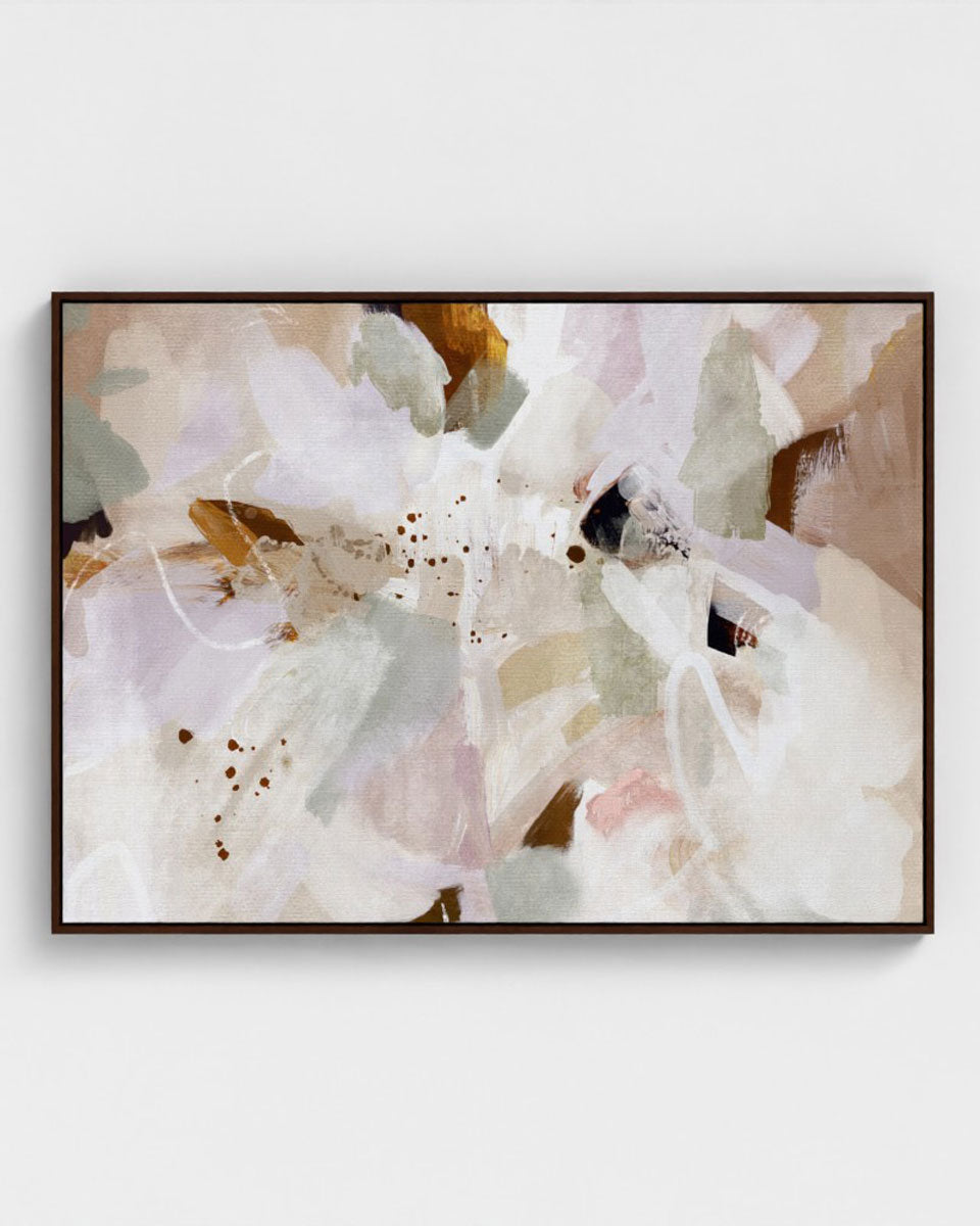 Framed abstract artwork with soft pastel colors on a white wall