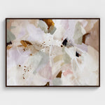 Framed abstract artwork with soft pastel colors on a white wall