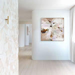 Modern interior with a floral painting on a white wall