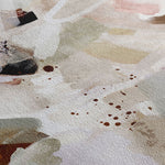 Close-up of an art print canvas with abstract art in neutral colours.