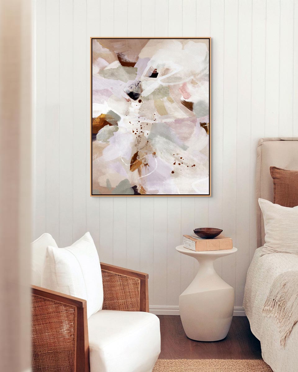 Decorative abstract painting on a wall above a bed in a bedroom setting.