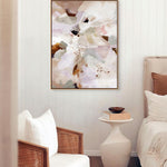 Decorative abstract painting on a wall above a bed in a bedroom setting.